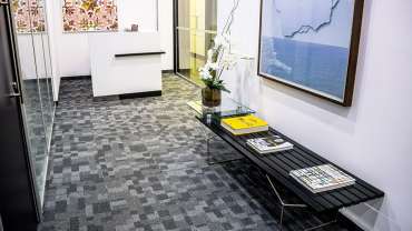Alfombra en la oficina: ¿tener o no tener?